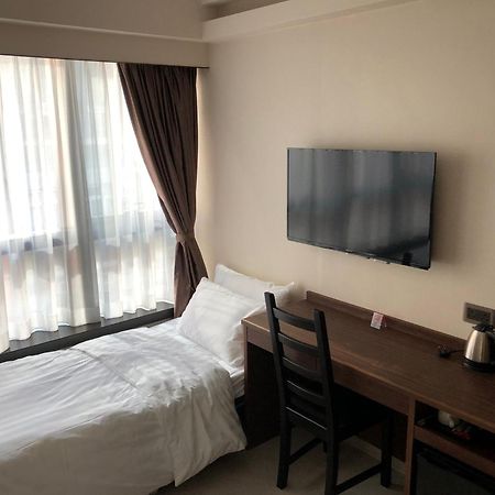 We Hotel Hongkong Værelse billede